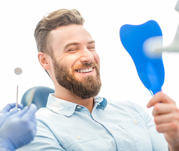 Patient in Melbourne smiling after dental checkup and cleaning at Eley Family Dentistry 