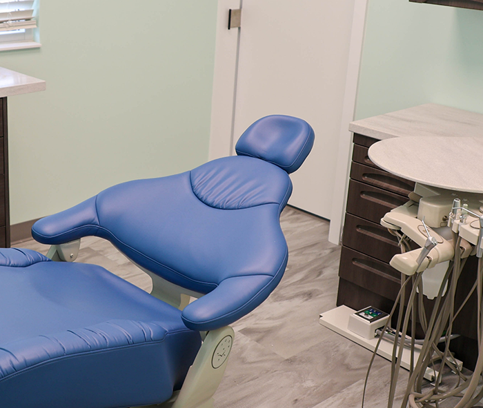 Empty treatment chair in dental office
