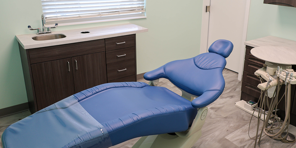 Dental treatment chair lying nearly flat